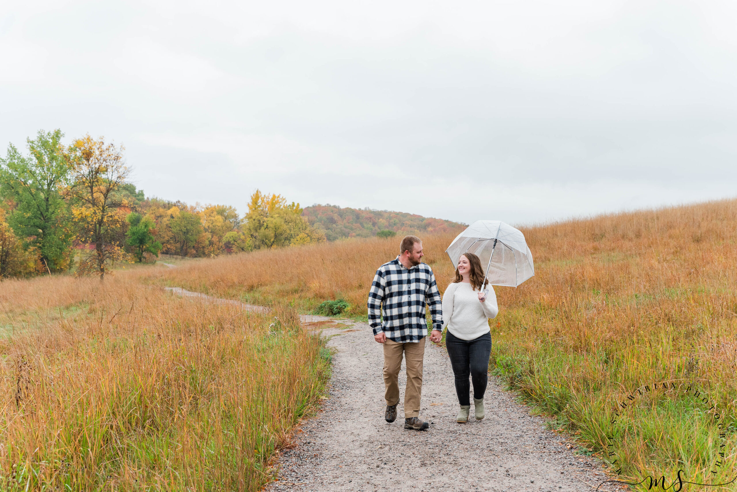 Two people walking a trail in Maplewood State Park