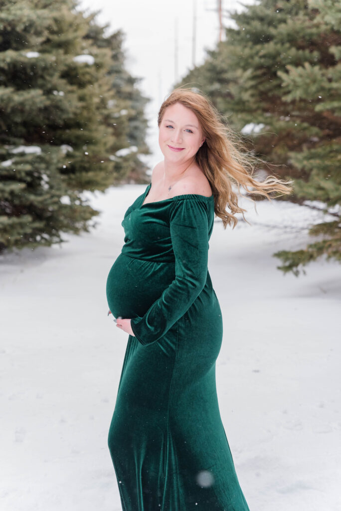 Woman in Green Maternity Dress