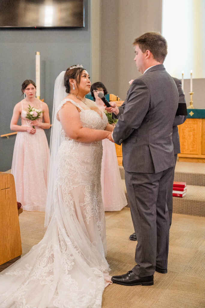 Bride saying her vows at Cormorant Lutheran Church in Cormorant, MN 