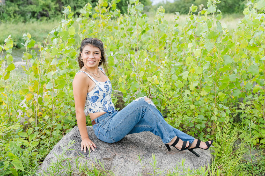 Senior Session in Pelican Rapids MN; Girl wearing Blue Top, Jeans and Black Heels