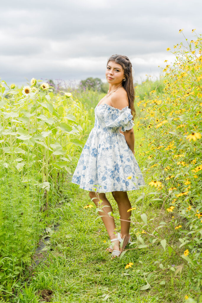 Senior Session at True Blue Flower Field in Vergas MN, wearing a blue dress